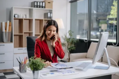 A woman at her well-organized, feng shui-inspired office desk